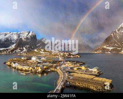 Aerial view of traditional wooden Rorbu fishermen`s huts in village of Sakrisoy on Moskenesoya Island in Lofoten Islands in Norway.  Overfishing and c Stock Photo